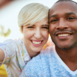 Two Young People Smiling