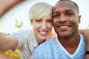 Two Young People Smiling